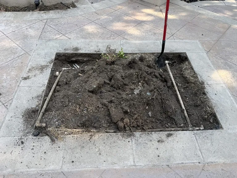 Burbank patio before a cedar raised kitchen garden was installed